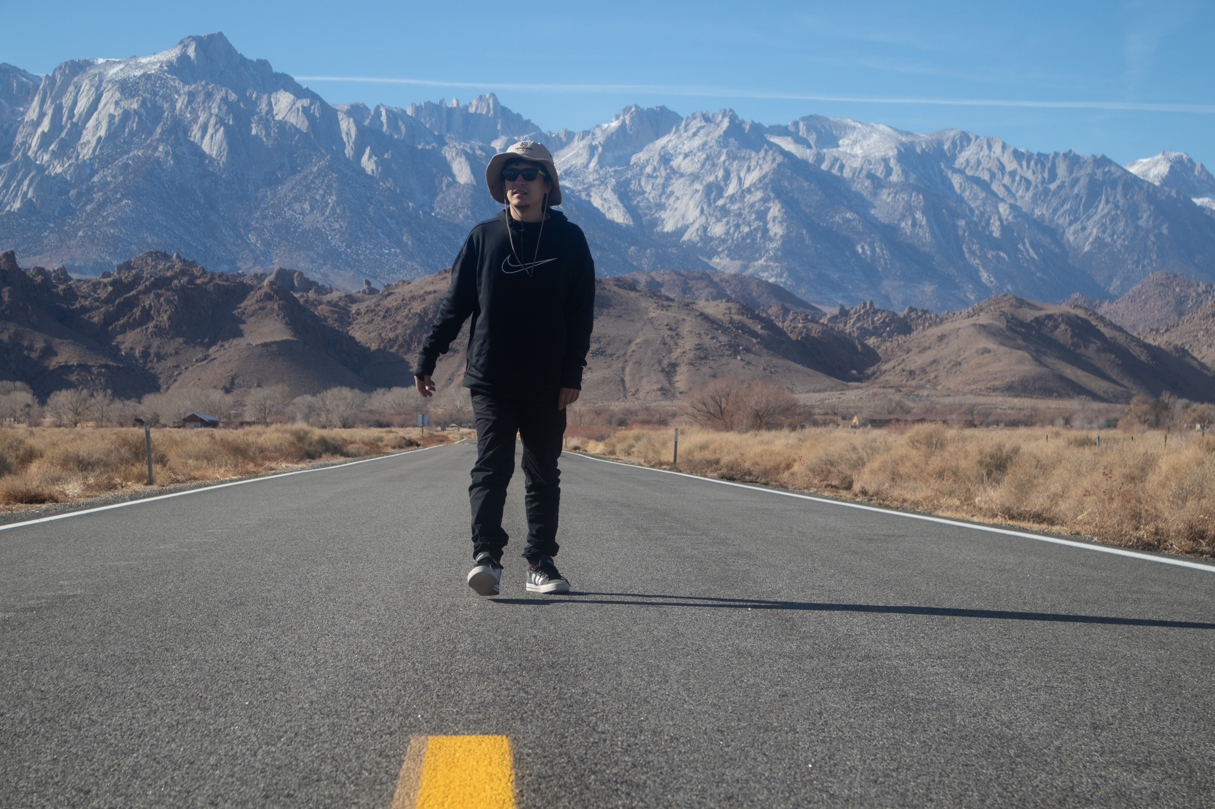 Creative explorer on mountain road